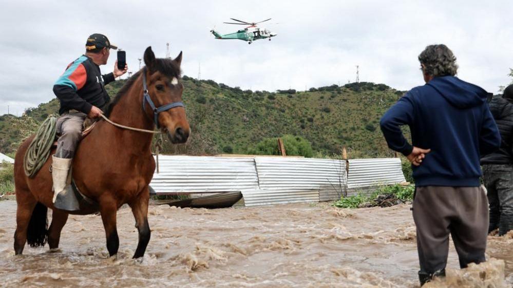 Central Chile Floods: Police Airlift Residents as Mapocho River Overflows