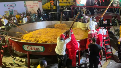 Giant Culinary Ambition: Nigerian Chef Aims for World Record with Massive Jollof Rice