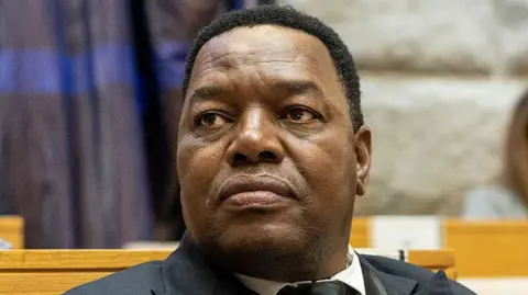 Suspension of South Africa's Police Chief Amid Corruption Charges