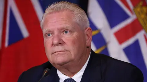 Ontario Premier to Suspend Controversial Anti-Tariff Advert Amid Trade Tensions with Trump