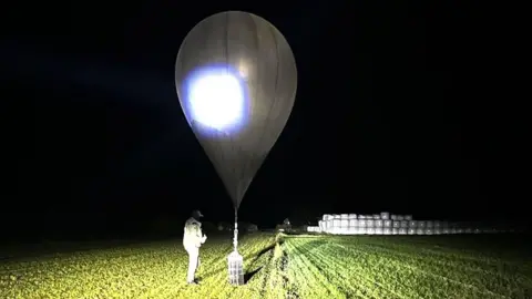 Smuggling Balloons Disrupt Lithuania's Air Traffic Amidst Tensions