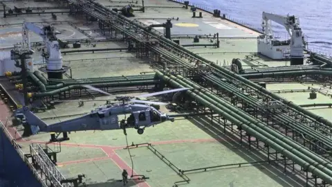 US Navy Boards Iranian Oil Ship Amid Rising Tensions in Strait of Hormuz
