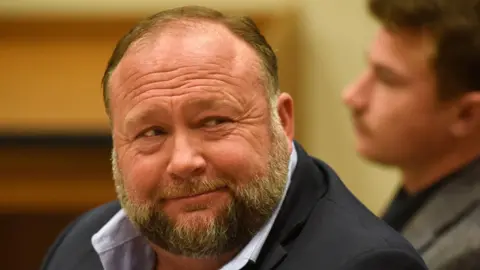 The Onion's Bold Plan to Turn Infowars into Satire